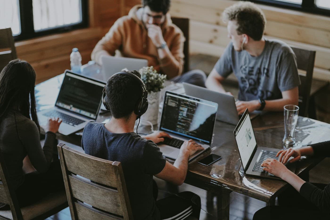 Illustrative team collaborating around a table